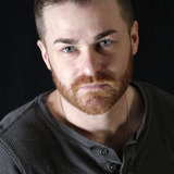 Jack Davis — Airport Patron (uncredited)