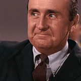 Bryan O'Byrne — Rutland Doorman (uncredited)