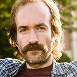 Adam Brooks — Greg