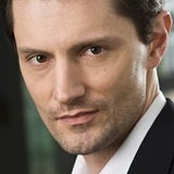 Джон Эммет Трэйси — Mark Wiggins