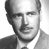 Patric Knowles — Dr. Frank Mannering