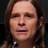 Thane Camus — Captain SRI (voice)