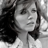 Agostina Belli — Marcella Valmarin alias Alba Doris