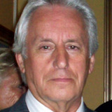 Al Conti — UN Ambassador (uncredited)