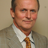 John Grisham — Narrator (uncredited)