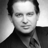 Riley G. Matthews, Jr. — Desk & Cell Officer (uncredited)