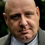 Shane McCaffrey — Officer Burland