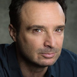 John Cassini — Cop #1