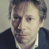 Mathieu Amalric — Dominic Greene