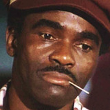 Eddie Smith — Courtroom Spectator (uncredited)