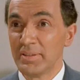 Andre Charisse — Hotel Concierge (uncredited)