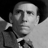 Dan White — Customs Officer (uncredited)