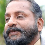 Nandu Poduval — Madhavan's Colleague