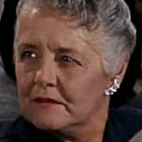 Helen Spring — Party Guest with Hat on Fire (uncredited)