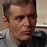 George Karas — Officer Ritchie