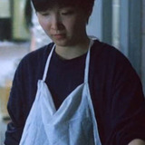 Kwan Lee-na — Woman Pressed to Buy Vegetables