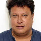 Tigmanshu Dhulia — Cameo as Man at the Post Office