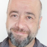Roberto Prieto — Man Discussing Hostelry 1