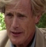 John Rogers — Self (archive footage) - Journalist
