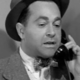 Jerry Hausner — Joe - the Bartender (uncredited)