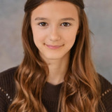 Eleanor Jones — Young girl in street (uncredited)