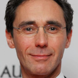 Guy Henry — Henrik Hanssen