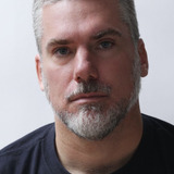 Glenn Fitzgerald — Reverend Brian Darling