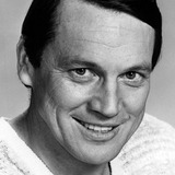 Sonny Shroyer — Enos Strate