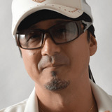 Takaya Kuroda — Starscream (voice)