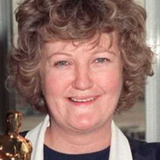 Brenda Fricker — as Lizzie Meany, Mrs. Meany