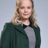 Katie Robertson — Dr. Grace Howlett