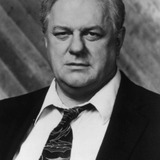 Charles Durning — Justice Henry Hoskins