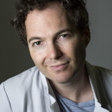 Justin Shenkarow — Michael Grunewald / Glen Glenn (voice)