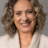 Eliane Giardini — Nazira Rachid