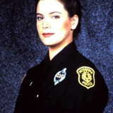 Liza Snyder — Officer Molly Whelan