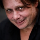 Massimiliano Caprara — Agente  Michele Deruta