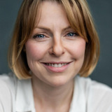 Helen Keeley — Guardswoman (voice)