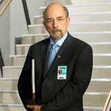Richard Schiff — Dr. Aaron Glassman