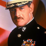 Gerald McRaney — Major John D. "Mac" MacGillis