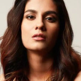 Shreya Dhanwanthary — Sucheta Dalal/Narrator