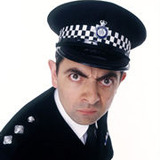 Rowan Atkinson — Inspector Raymond Fowler, QPM