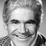 Ronny Graham — Mr. Ernest Busso