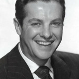 Robert Cummings — Dr. Robert McDonald