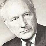 John Zaremba — Dr. Raymond Swain