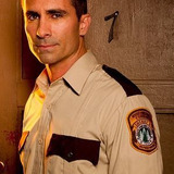 Nestor Carbonell — Sheriff Alex Romero