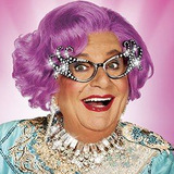 Barry Humphries — Dame Edna Everage (Host)