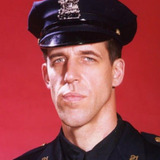 Fred Gwynne — Officer Francis Muldoon