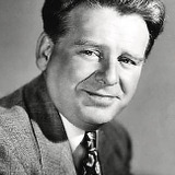 Wallace Ford — Marshal Herk Lamson