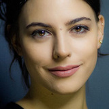 Dilhan Naz Özgülüş — Eylem