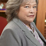 Kathy Bates — Harriet 'Harry' Korn